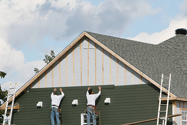 Professional Siding Installation technician working in Schwenksville, PA